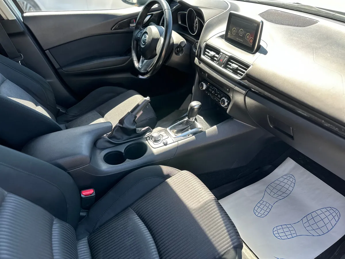 Mazda 3 1.6 AT (104 л.с.)