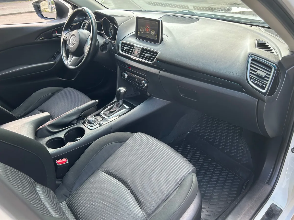 Mazda 3 1.6 AT (104 л.с.)