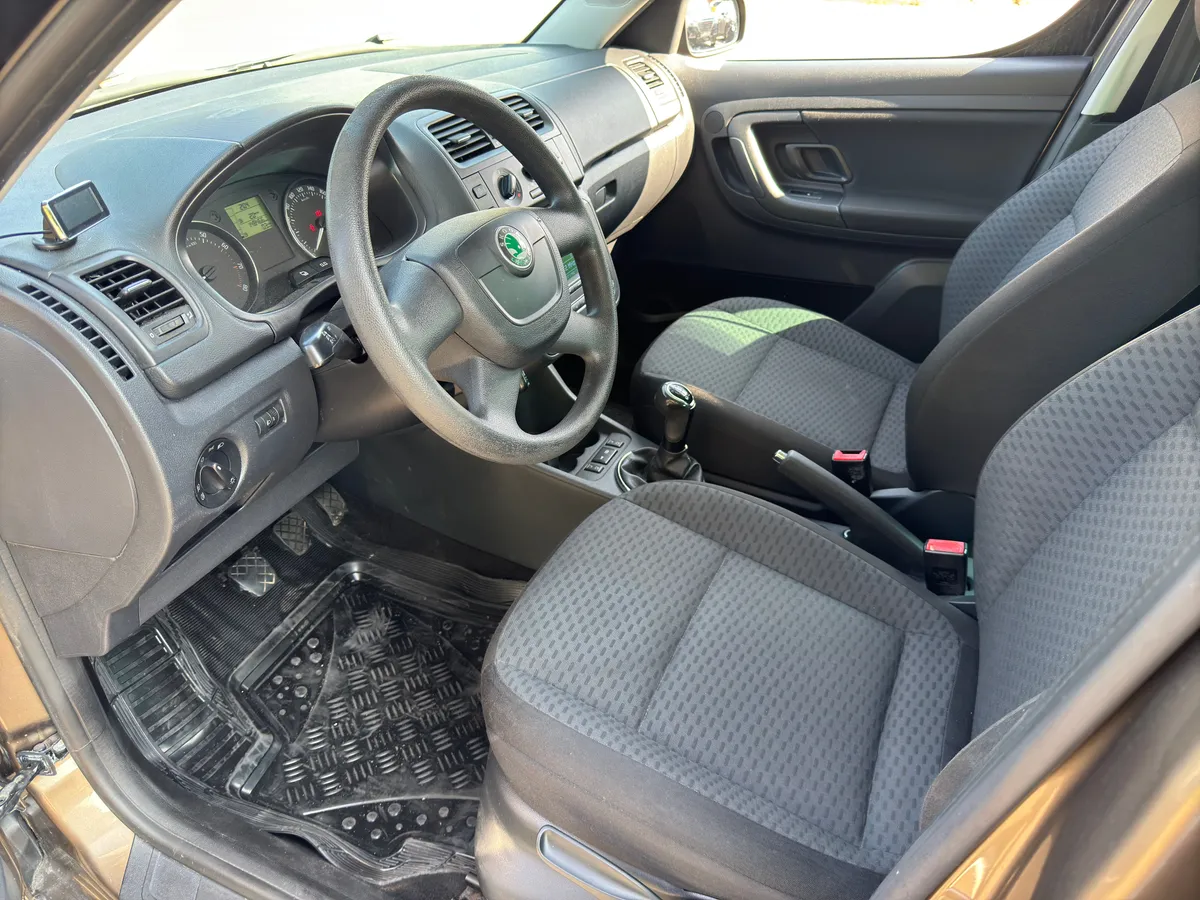 Skoda Roomster 1.4 MT (86 л.с.)