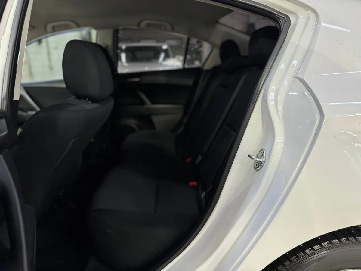 Mazda 3 1.6 AT (104 л.с.)