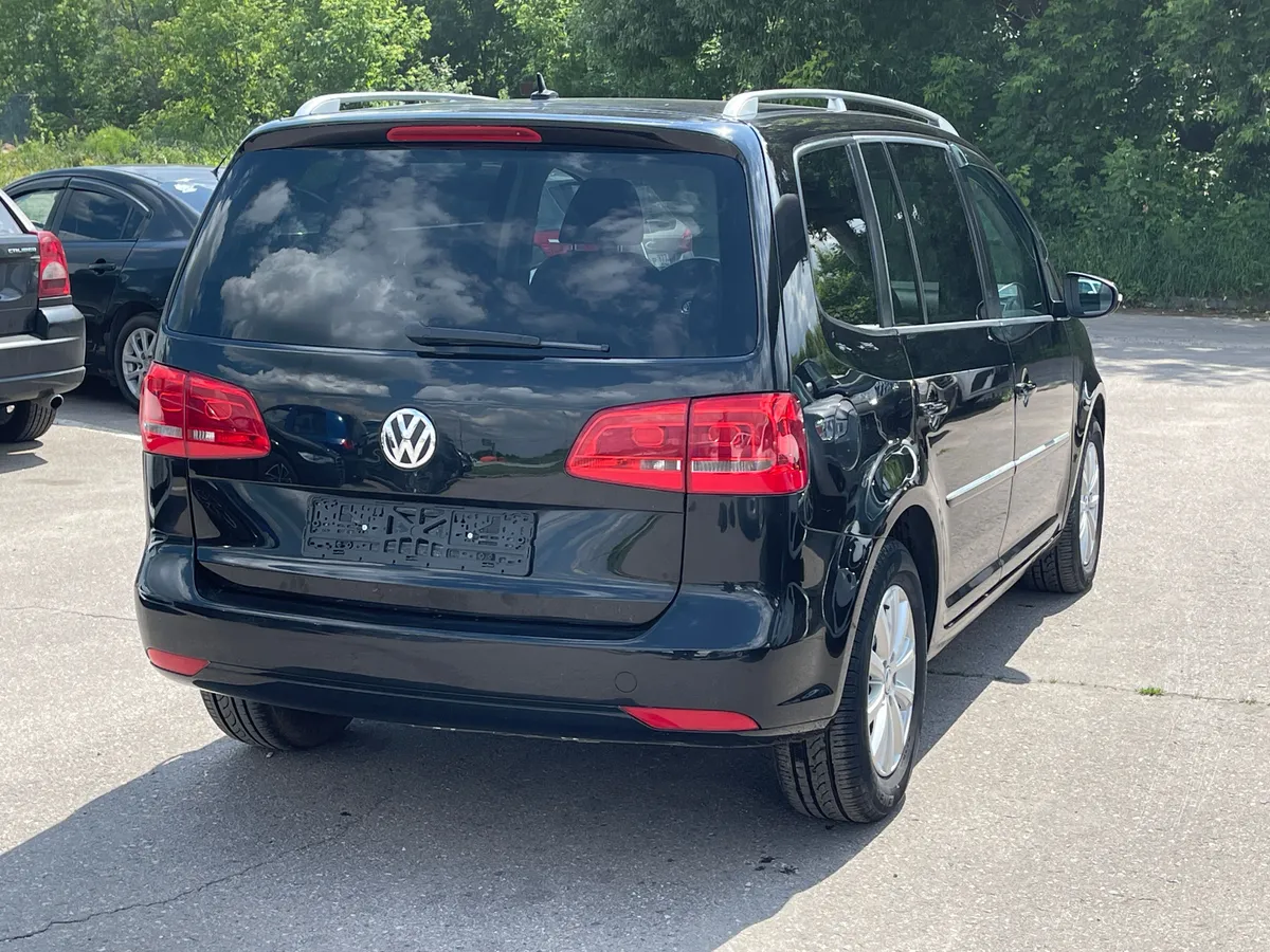 Volkswagen Touran 1.4 TSI DSG (140 л.с.), 2010 — фото 4