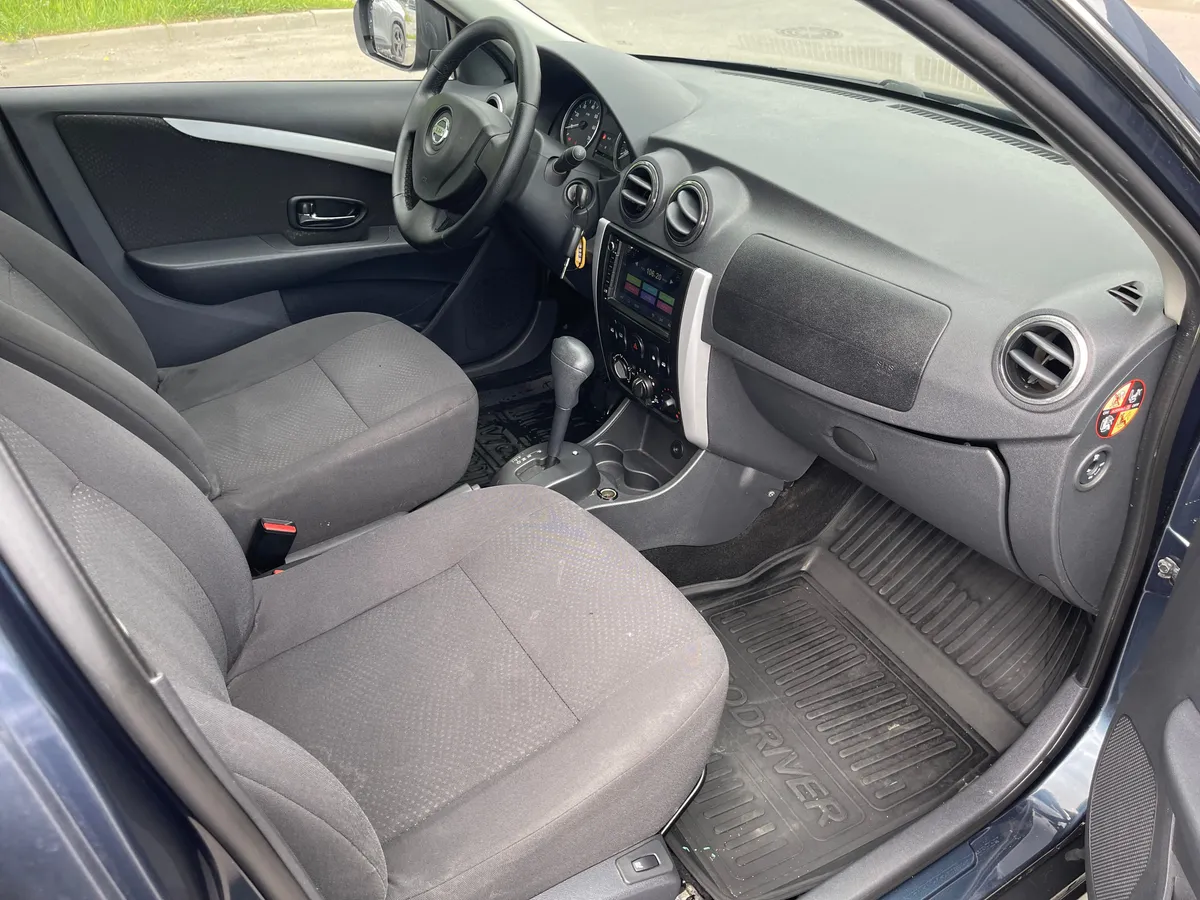 Nissan Almera 1.6 AT (102 л.с.)