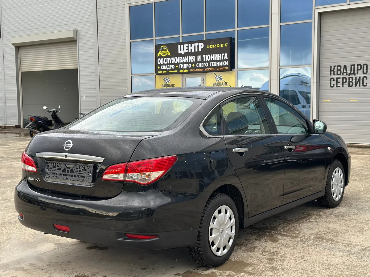 Nissan Almera 1.6 MT (102 л.с.)