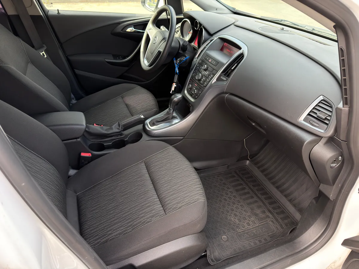 Opel Astra 1.6 AT (115 л.с.)